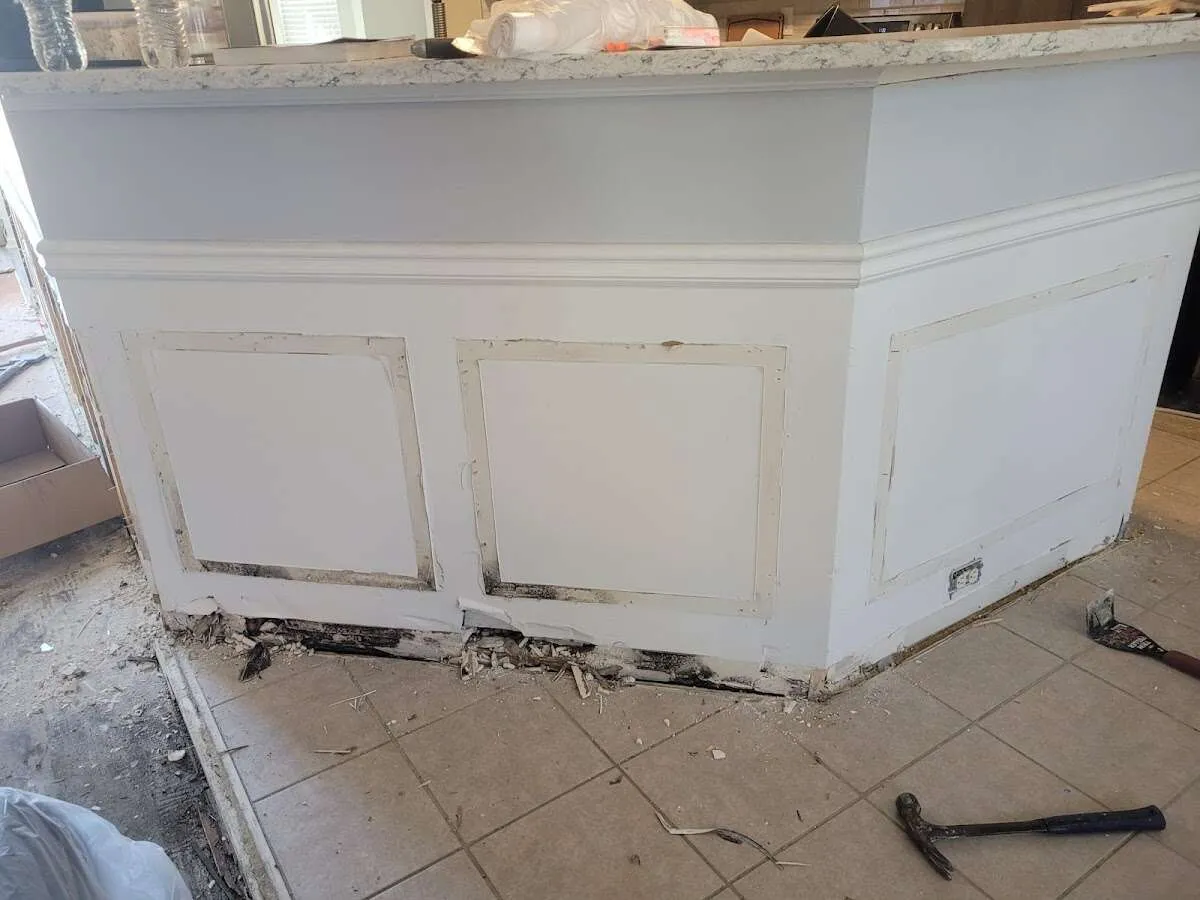 Water damage and mold on kitchen during Storm Damage Restoration in Fontana